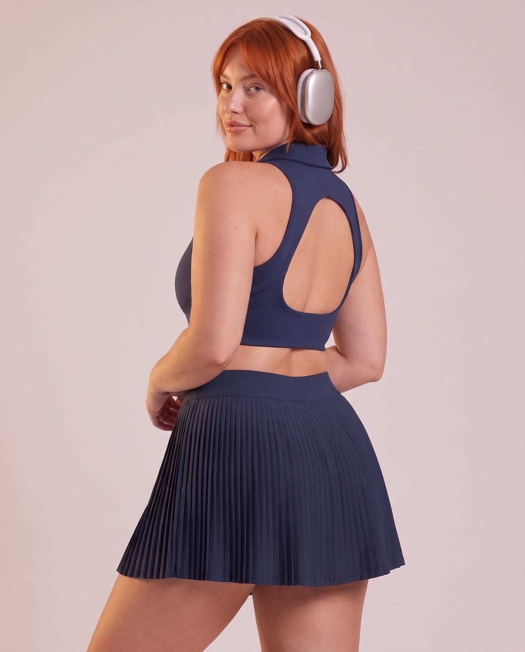 Pleated performance mini skirt